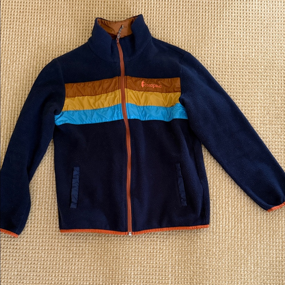 Cotopaxi Navy Fleece Jacket with Brown  and Blue Accents